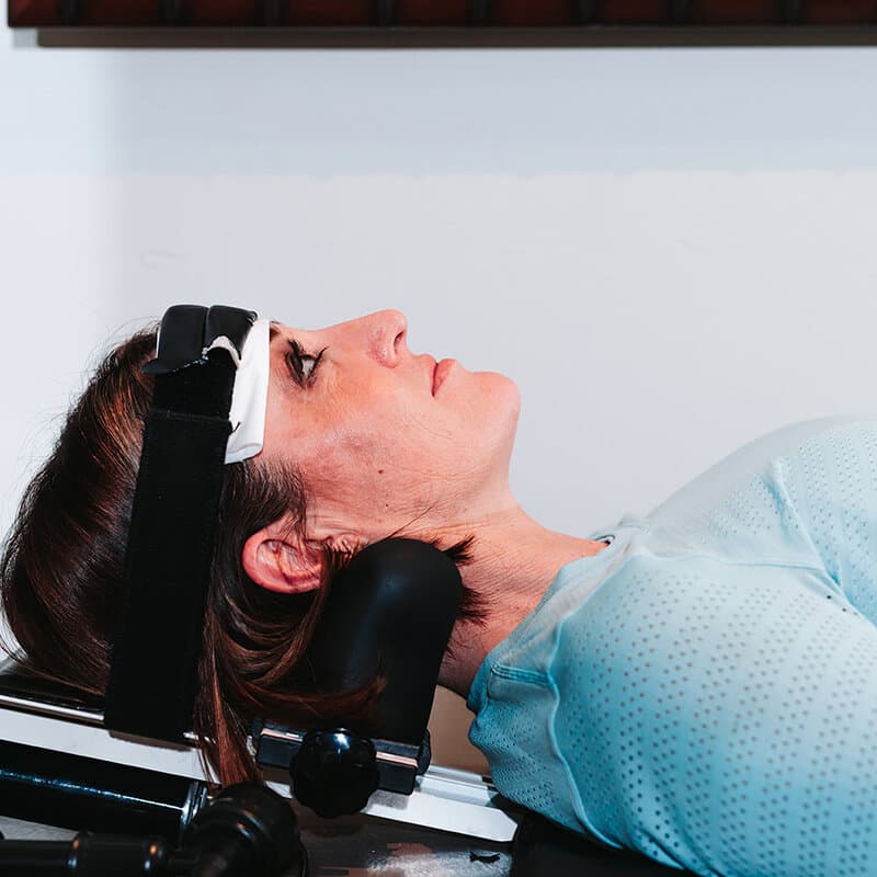 Patient receiving cervical traction therapy at Foudy Chiropractic