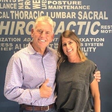 Dr. Foudy and a patient giving a thumbs up after care